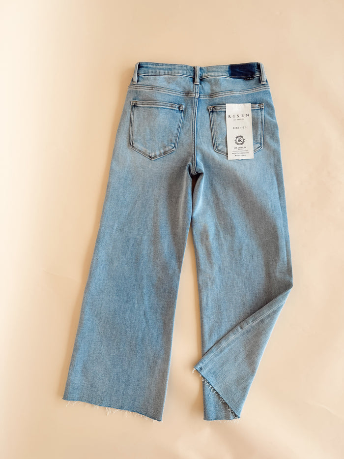 Risen Midi Rise Raw Hem Jeans Light