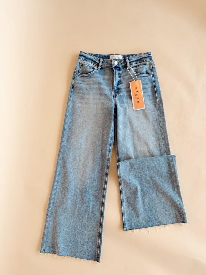 Risen Midi Rise Raw Hem Jeans Light